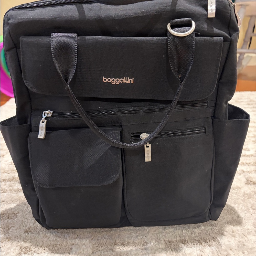 Baggallini Black Laptop Backpack w/luggage sleeve. Lots of pockets!